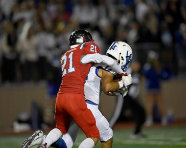 Futbolcuların bir futbol maçı sırasında inanılmaz oyunlar yapmalarının harika aksiyon fotoğrafları.