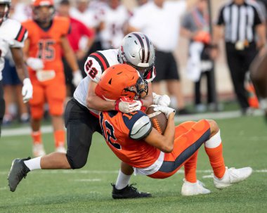Futbolcuların bir futbol maçı sırasında inanılmaz oyunlar yapmalarının harika aksiyon fotoğrafları.