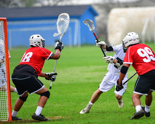 Young athletes making amazing plays while playing Lacrosse