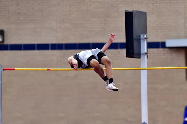 Boy Athletes Performing High Jump Track Field Meet — Stock Photo, Image