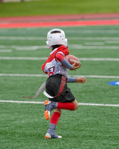 Young kids playing flag football