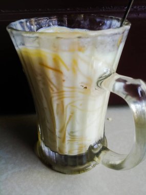 Onam special Vermicelli payasam made in a glass with a spoon with a spoon. Special desert or sweet made of vermicelli and milk of a glass. The glass is a spoon in the top..