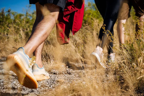 People Climb Mountain Path Bushes Feet Close Shooting Shoes While — Stock Photo, Image