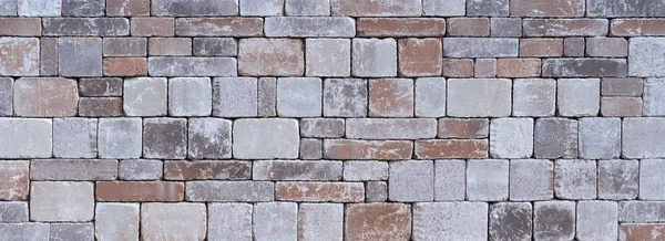 Panorâmica Uma Parede Pedra Feita Pedras Naturais Diferentes Quadradas Cinzentas — Fotografia de Stock