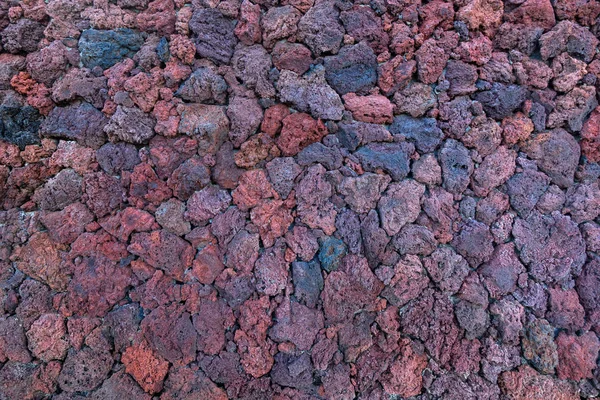 Detalhe Uma Parede Feita Pedras Lava Avermelhadas Azuladas Tomadas Hierro — Fotografia de Stock