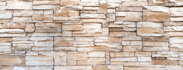 Грубая Стена Ярких Удлиненных Квадратных Камней Сложенных Блоки — стоковое фото