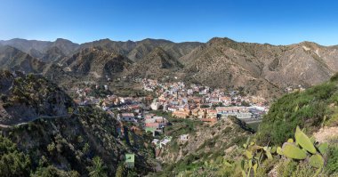 Panorama of Vallehermoso, La Gomera, Canary Islands, Spain, with cloudless blue sky  clipart