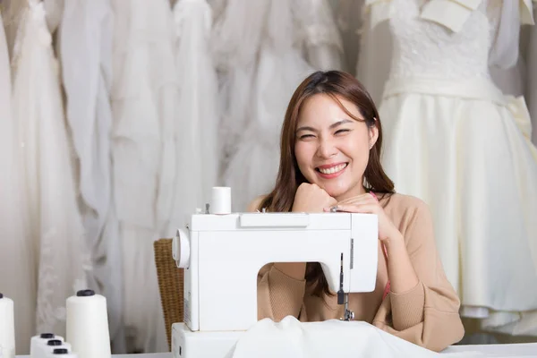 Wedding Dress Rental Shop Owner Sitting Sewing Machine Smiling Cute — Stock Photo, Image