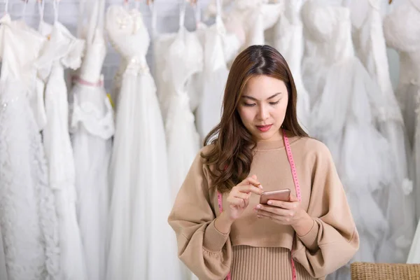 Woman Designer Holding Smartphone While Checking Online Orders Dress Shop — Stock Photo, Image