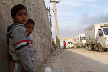 Red Crescent humanitarian aid enters Douma near Damascus