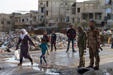 Soldiers and civilians Douma near Damascus clipart