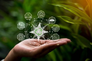 Çevre simgeleriyle el ele tutuşan teknoloji, yeşil arkaplanda Ağ bağlantısı üzerinden.