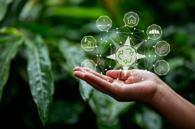 Çevre simgeleriyle el ele tutuşan teknoloji, yeşil arkaplanda Ağ bağlantısı üzerinden.