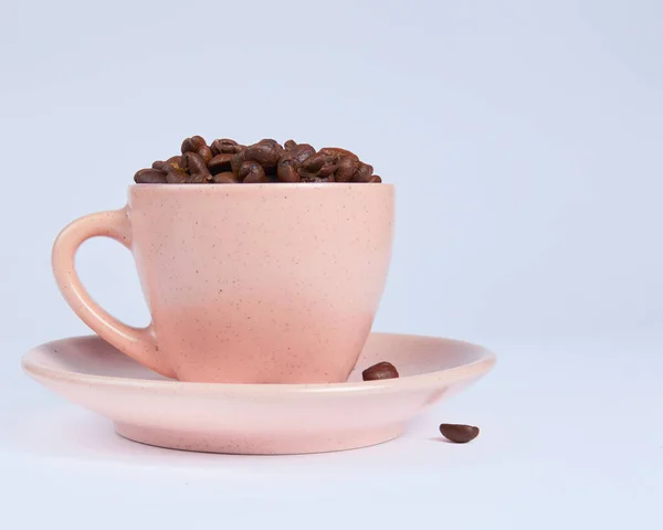 stock image Coffee beans in a cup on a white background