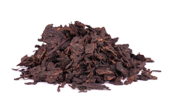 Té chino Shou Puer. Té Pu-erh fermentado prensado. Macro de cerca. Té negro aromático. Bebida saludable . —  Fotos de Stock