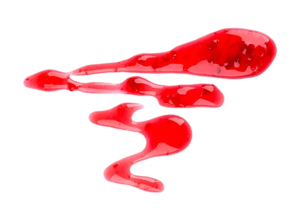 Llovizna de mermelada de cereza aislada sobre fondo blanco. Salpicaduras de mermelada de bayas rojas. Vista superior . —  Fotos de Stock