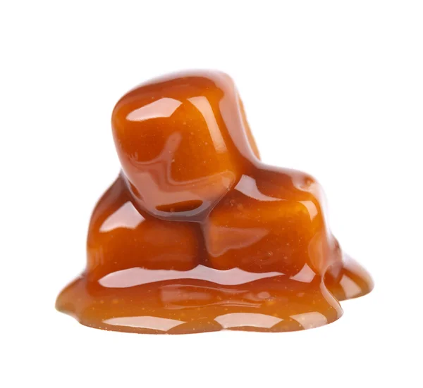 Dulces caramelos y salsa, aislados sobre fondo blanco. Delicioso caramelo . — Foto de Stock