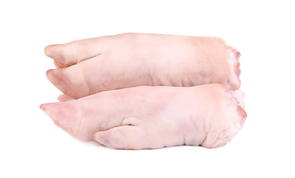 Rauwe varkenspoten, geïsoleerd op een witte achtergrond. Verse varkens hoeven. — Stockfoto