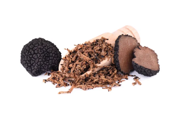 Grated Truffle on a wooden spoon. Fresh black truffles isolated on a white background. Delicacy exclusive truffle mushroom. Piquant and fragrant French delicacy. Clipping path. — Stock Photo, Image