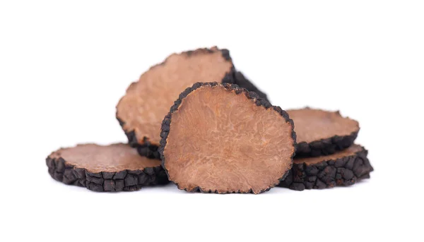 Zwarte truffels geïsoleerd op een witte achtergrond. Verse gesneden truffel. Delicacy exclusieve truffel champignon. Pikante en geurige Franse delicatesse. Knippad. — Stockfoto