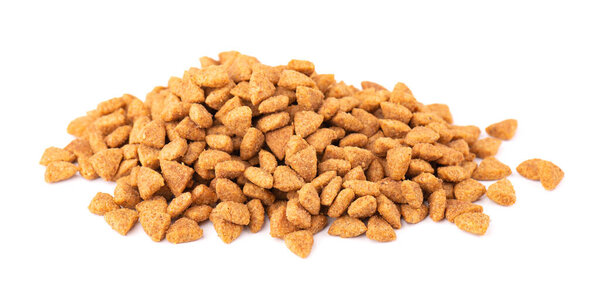 Dry pet food, isolated on white background. Pile of granulated animal feeds. Granules of good nutrition for dogs and cats