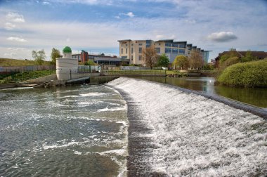 Weir across the River Derwent in Derby, England, UK clipart