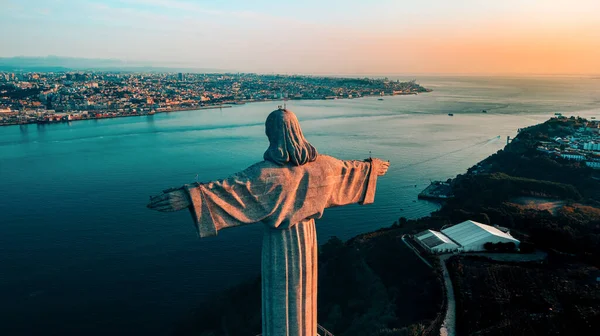 Aerial view of Sanctuary of Christ the King, Santuario de Cristo Rei and Lisbon city, Portugal. Drone photo at sunrise. Catholic monument — Stock Photo, Image