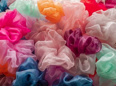 Biçim ve renklerde arkaplan renkli kumaşlar. Odağı kapat.