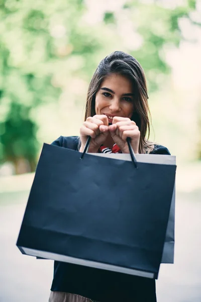 Head Shot Happy Young Woman Holding Paper Bags Shopping — Stock Photo, Image