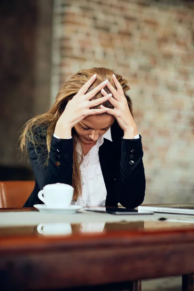 Businesswoman Sitting Cafe Holding Head Hands Desk Coffee Laptop — Stock Photo, Image