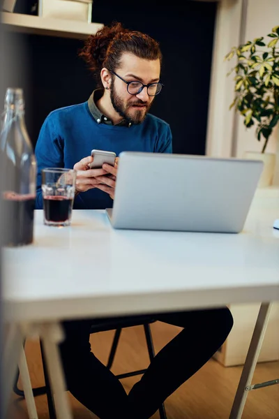 Young Attractive Bearded Hipster Sitting His Office Drinking Coffee Using — Stock Photo, Image
