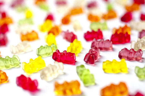 Detail of colorful bears candy on white background