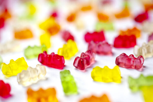 Detail of colorful bears candy on white background
