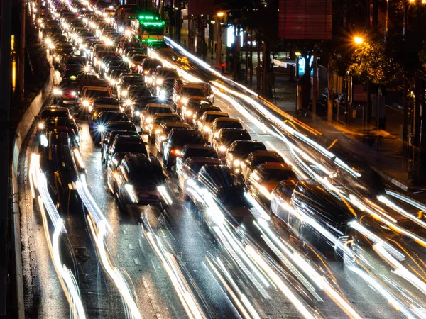 Traffic city at night, cars on the street with long exposure light  traces from car