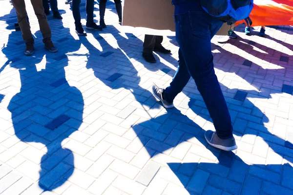 Silhouettes of people with banners. The concept of protest and strike.