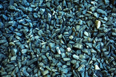 Granit ezilmiş taş. İnşaat işi için çok küçük taşlar. Yukarıdan görüntüle.