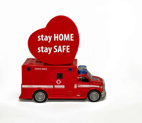 An ambulance with red hearth with white background