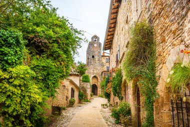 Beautiful medieval village of Bruniquel on the river Aveyron in Occitania, France clipart