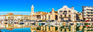 Panorama of the facades on the canals of Sete, in the Herault in Occitania, France clipart