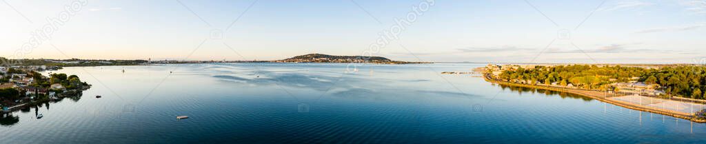 Aerial panoramic of the Thau lagoon and Mont-Saint-Clair from Balaruc, in Hrault in Occitania, France