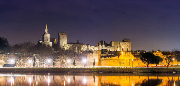 Pont Saint-Benezet and Palais des Papes in Avignon at night in Vaucluse, Provence, France