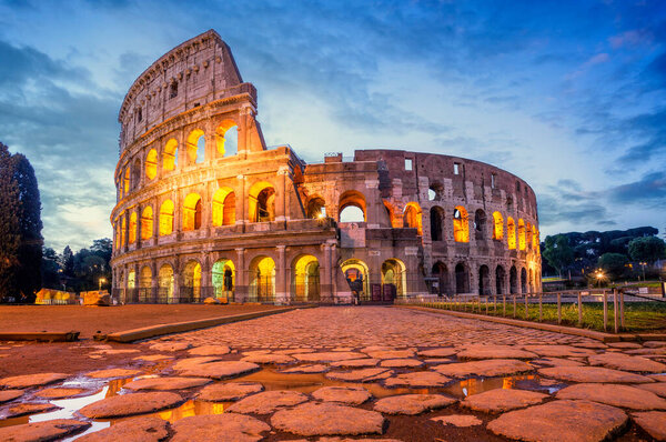 Colosseum morning in Rome, Italy. Colosseum is one of the main attractions of Rome. Rome architecture and landmark.
