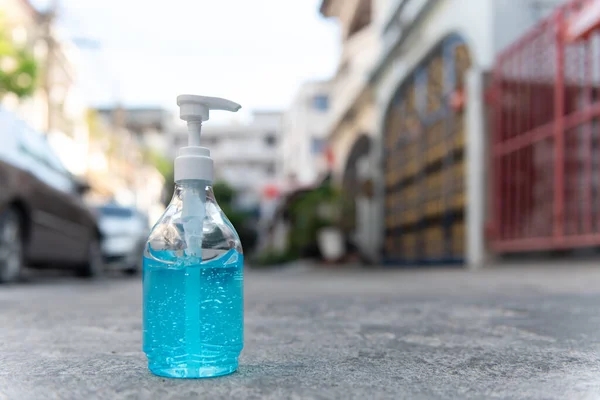 Ethyl Alcohol, hand gel placed on the street in front of the house, concept for coronavirus, covid19