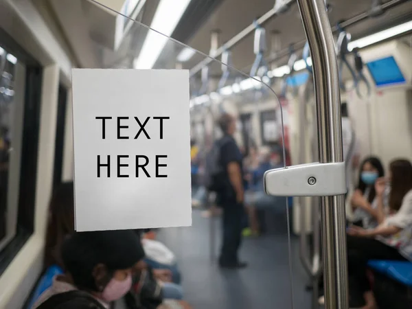 Blank white ads space advertising board for text on subway or sky train, copy space, traveling in the city