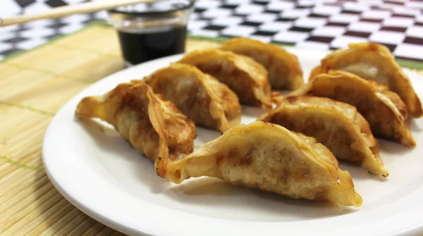 Asian Fried Dumplings Soy Sauce Chopsticks Bamboo Placemat — Stock Photo, Image