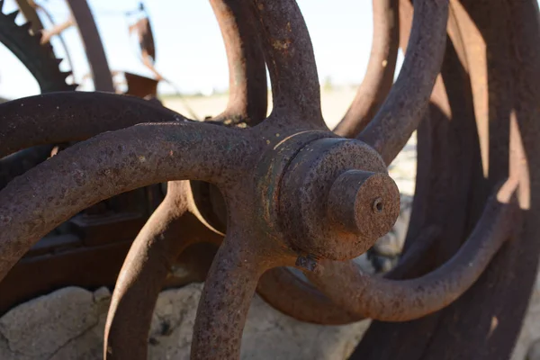 metallic and industrial gear in field