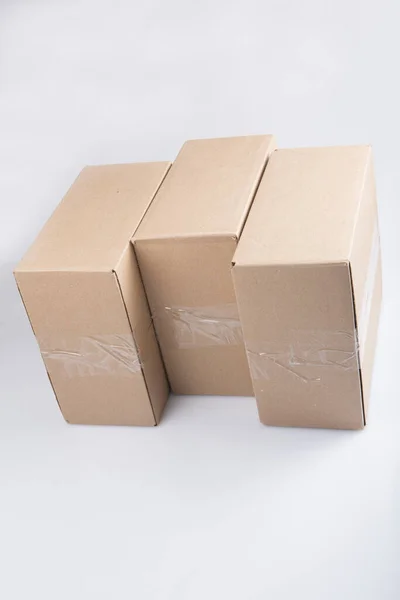 Isolated Close Shot Three Stacked Closed Rectangular Blank Brown Carton — Stock Photo, Image