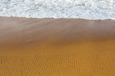 Güzel, dolgulu çerçeve, deniz manzaralı duvar kağıtlarının arka plan çekimleri, Hint okyanusunun beyaz köpüklü dalgaları, güzel dokular ve desenler oluşturur. Pitiwella plajı, Sri Lanka