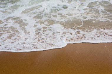 Güzel, dolgulu çerçeve, deniz manzaralı duvar kağıtlarının arka plan çekimleri, Hint okyanusunun beyaz köpüklü dalgaları, güzel dokular ve desenler oluşturur. Pitiwella plajı, Sri Lanka