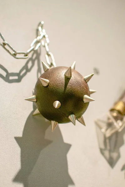 Iron ball with metal sharp spikes of the flail medieval weapon.